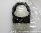 A picture of step 5 of Doll Festival Bento with Mickey and Minnie Onigiri.