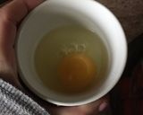 A picture of step 3 of Poached Eggs 🍞🍳.