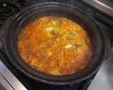 A picture of step 3 of With Delicious Meatballs! Easy Kimchi Nabe (Hot Pot).