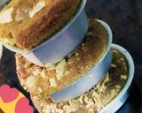A picture of step 8 of Vanilla almond cake with three layers.