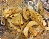 A picture of step 2 of Grilled Pork Chops With Creamy Mushroom Sauce.