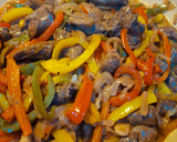 A picture of step 7 of Keto Wors and Sweet Peppers.