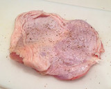 A picture of step 1 of Authentic Garlic Chicken in a Frying Pan.