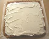 A picture of step 12 of Snowy White Bûche de Noël (Yule Log).