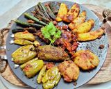 A picture of step 6 of Achari tawa vegetables.