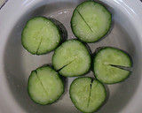 A picture of step 1 of Oi-sobagi with Cucumbers & Kimchi.