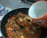 A picture of step 6 of Poori aur chana aloo ki sabzi.