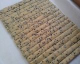 A picture of step 7 of Macrobiotic Crispy Sake Lees Snack Sticks.