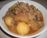 A picture of step 4 of Super Delicious!! Pork & Daikon Simmer.