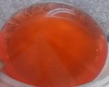 A picture of step 2 of Beckie's Peach Jello Cake.