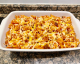 Foto del paso 9 de la receta: Macarrones con salchichas y chorizo, rellenos de queso