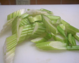 A picture of step 1 of Celery Pickles.