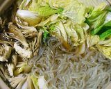 A picture of step 4 of Our Family's Recipe Kiritanpo Hot Pot.