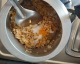 A picture of step 1 of Flatten rice oats salty porridge.