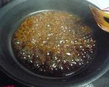A picture of step 3 of Fragrant Tazukuri - Sweet-savory crunchy tiny sardines.