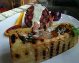 Foto del paso 13 de la receta: Lomo envuelto en panceta con cajita de papa rellena y cebollas