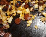 A picture of step 2 of Chorizo and Eggs in a Cheesey Tomato Sauce.