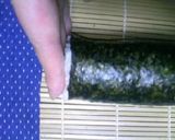 A picture of step 7 of Salmon and Avocado Fat Sushi Rolls (Futomaki).