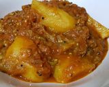 A picture of step 8 of Bharta style baigan aloo.