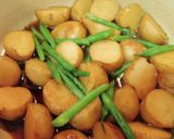 A picture of step 6 of Simmered Spring Potatoes and Green Beans.