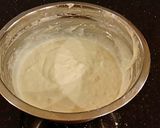 A picture of step 3 of Vanilla Christmas Layer Cake with Creamy Vanilla Buttercream Frosting.