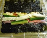 A picture of step 5 of California Rolls (Popular in the States).