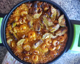 Foto del paso 4 de la receta: Paella con calamares alcachofas y langostinos  35