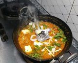 A picture of step 6 of Eid special peshawari chicken karahi.