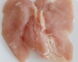 A picture of step 1 of My Steamed Chicken on a bed of Salad.