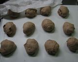 A picture of step 5 of Chewy Little Walnut-Raisin Whole Wheat Rolls.