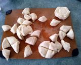 A picture of step 2 of Chicago Style Deep Dish Pull Apart Pizza.