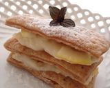 A picture of step 6 of Honey Lemon Napoleon Cakes.