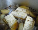 A picture of step 5 of Great With Eggs or Tofu: Simmered Beef Tendon and Daikon Radish.