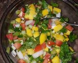 A picture of step 2 of Black Bean and Mango Salad.