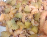 A picture of step 6 of Cheeseburger Cassarole.