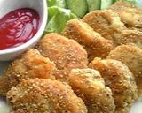 A picture of step 5 of White Sesame & Cheese Coated Chicken Breast Cutlets.