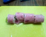 A picture of step 4 of ham and pickle rolls.