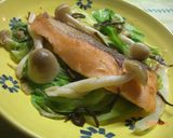 A picture of step 7 of Pn-Fried and Steamed Salmon and Cabbage.