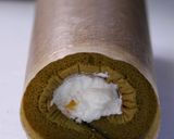A picture of step 13 of Matcha Roll Cake White Chocolate Cream.
