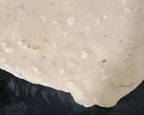 A picture of step 3 of Tikona paratha.