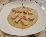 Foto del paso 6 de la receta Dados de pollo en salsa de calabacín y nueces