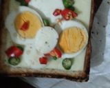 A picture of step 4 of Chilly, Egg cheese sandwich.