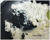 A picture of step 2 of Desiccated Coconut Laddoo.