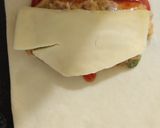 A picture of step 13 of 3 spice chicken filled bread.