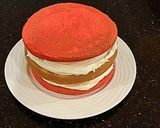 A picture of step 13 of Vanilla Christmas Layer Cake with Creamy Vanilla Buttercream Frosting.