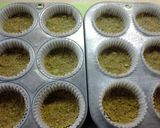 A picture of step 2 of Frozen Pistachio Yogurt Fruit Cups.