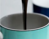 A picture of step 3 of Chocolate hazelnut mug cqkes.