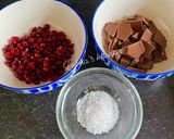 A picture of step 1 of Chocolate Pomegranate Bites with Sea Salt:.