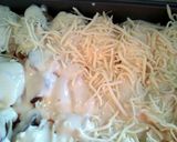 A picture of step 6 of Stuffed shells with two sauces.