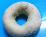 A picture of step 7 of Crunchy Orange Bagels.